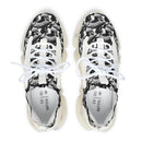 Top view of stylish black and silver abstract print women's mesh sneakers, showcasing modern design and comfort.