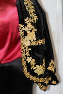 Black golden velvet blazer with intricate gold embroidery, showcasing elegance and sophistication.