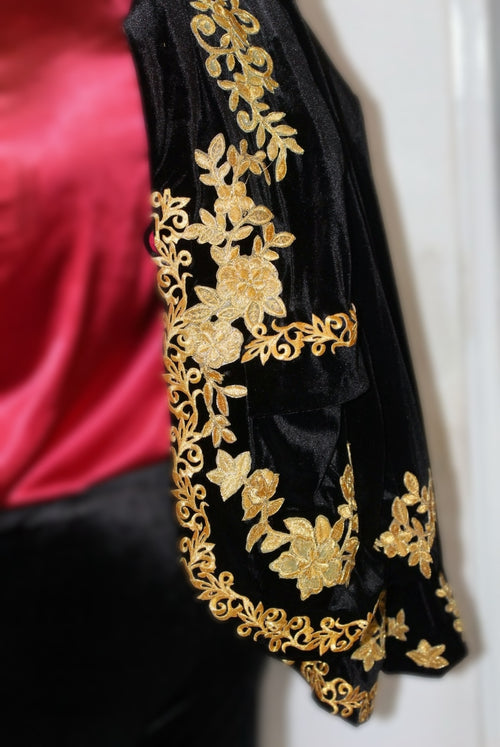 Black golden velvet blazer with intricate gold embroidery, showcasing elegance and sophistication.