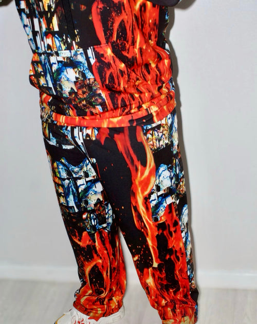 Divine Flame Trousers with bold fire print, perfect for stylish men seeking a unique fashion statement.