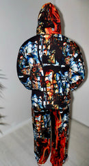 Back view of Divine Flame Trousers and matching jacket with bold print in fiery colors.