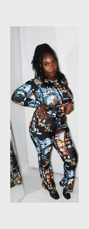 Model showcasing a bold, multi-colored printed outfit featuring a long-sleeve top and matching pants. Stylish and vibrant design.