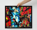 Framed poster of 'Divine Fire' artwork, depicting contrasts of pain and hope with vivid colors and chaotic forms.